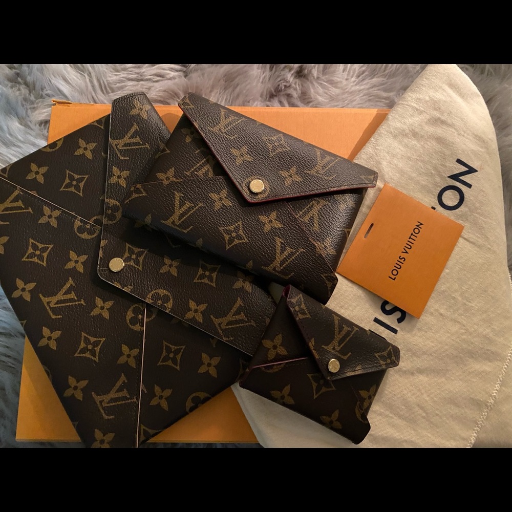 LV pochette includes all (3)